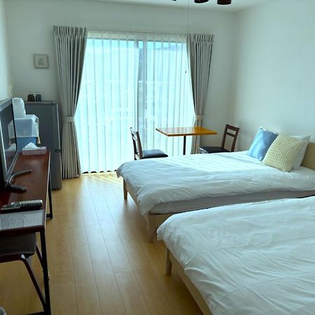 Nakijin Resort Guest House מראה חיצוני תמונה